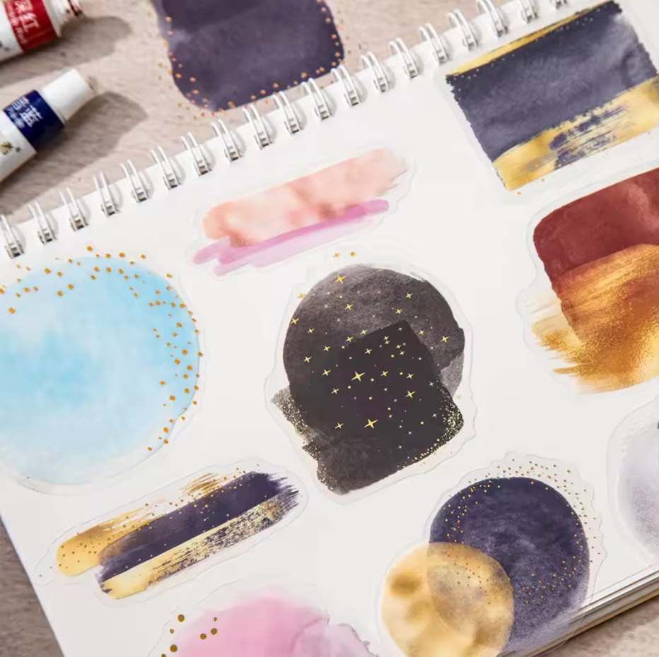 6 paquetes de 10 Stickers manchas acuarela & brillos dorados