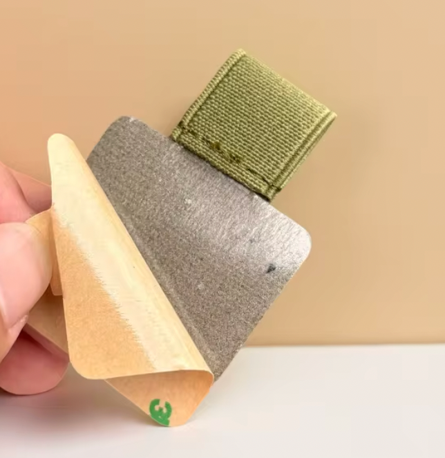 Soporte de pluma con elastico