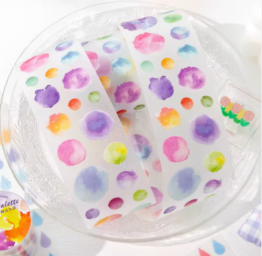 Rollo de stickers coloridos precortados con ligero glitter